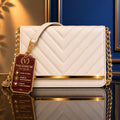 Valenium sling bag white gold chain